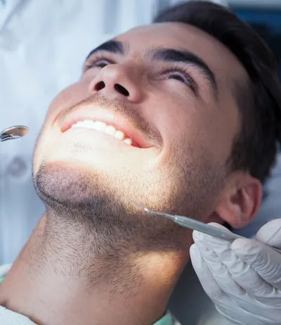 man smiling during his cosmetic dentistry appointment at Stonebriar Family Dentistry in Frisco, TX